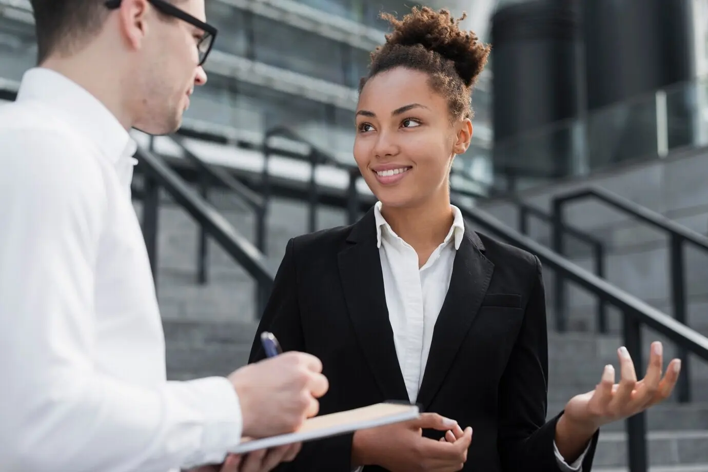 Medium shot of colleagues collaborating.